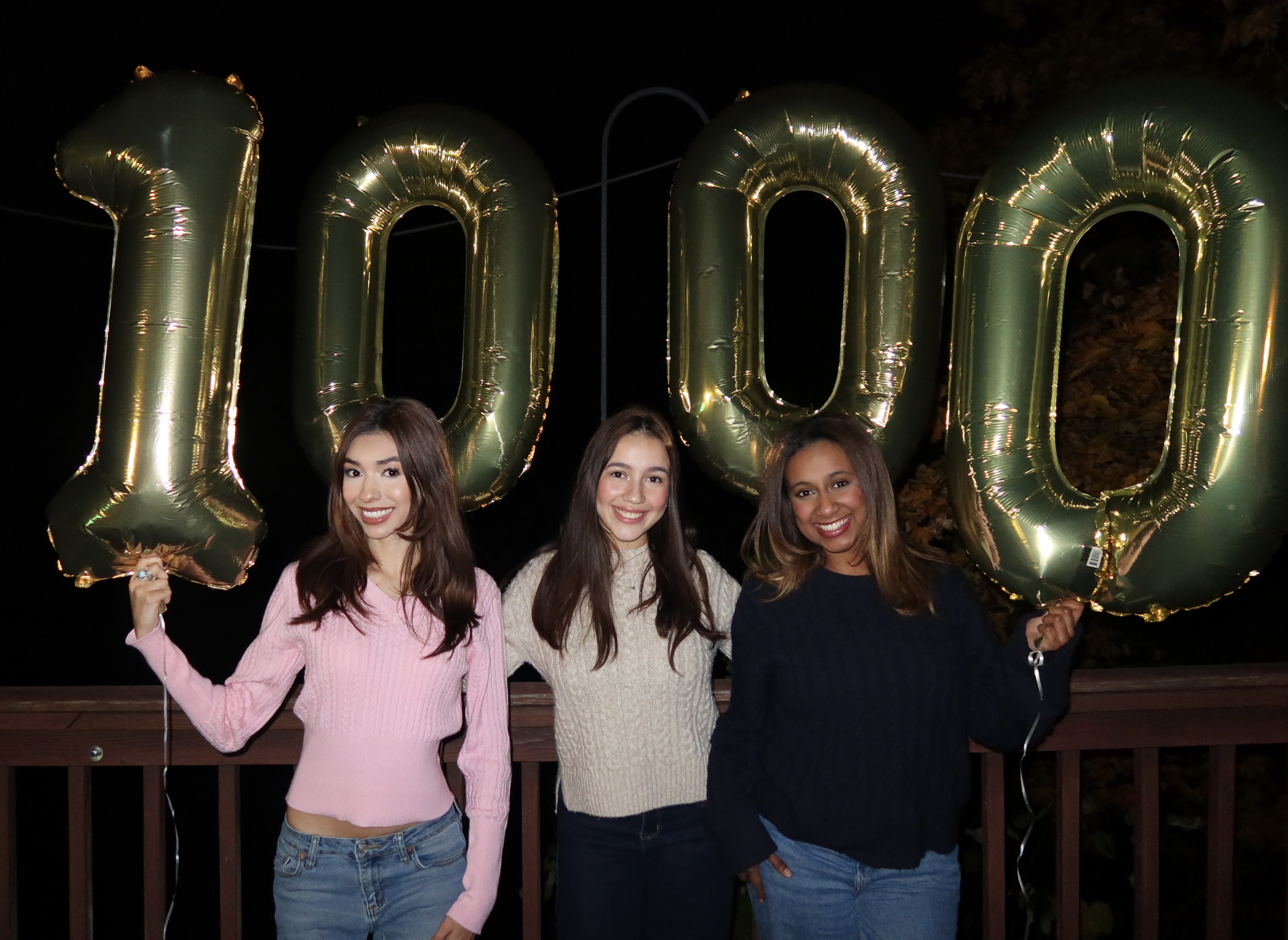 All About Hburg team celebrating 1000 followers outdoors